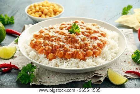 Chickpeas Curry With Rice, Tomato And Poppadoms In White Plate. Healthy Tasty Vegetarian Food