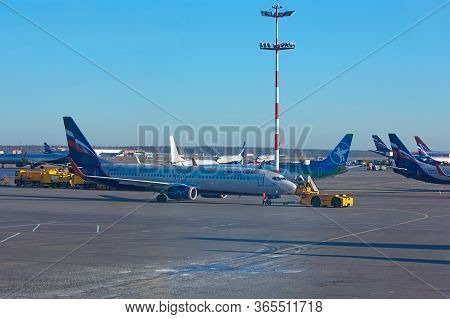 Sheremetyevo, Moscow, Russia. 12/04/2019. Airport Service, Pushback Tractor Towing The Plane To The 