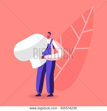 Tiny Male Character In Working Overalls Collecting Fresh Harvest Of Champignons On Mushroom Growing 