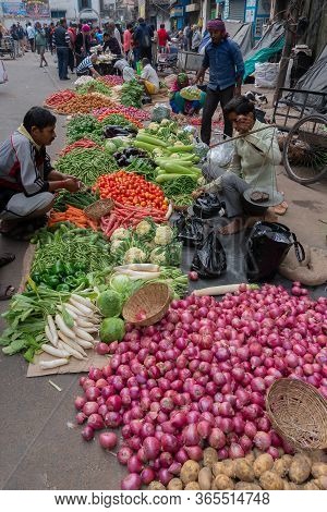 Kolkata, West Bengal, India - 16th December 2018 : Vegetables For Sale. Young Man Selling Them To Cu