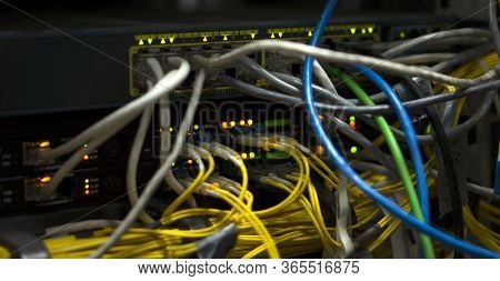 Telecommunication Equipment In The Server Room. Internet Connection Inside A Closed Territory. Detai