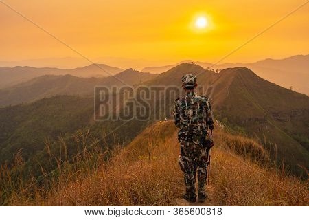 Forester Or Forest Ranger Hiking In The Mountains At Khao Chang Puak Mountain Thailand