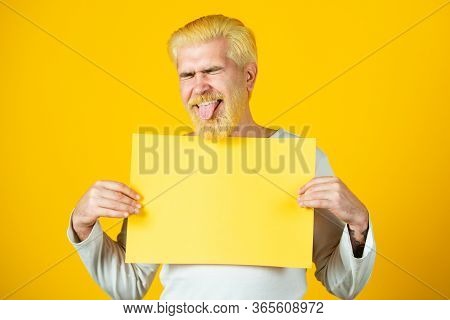 Funny Men Showing Empty Yellow Board With Copy Space For Advertisement
