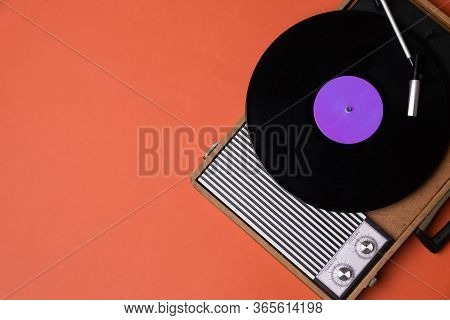 Retro Vinyl Player And Turnable On A Background. Entertainment 70s. Listen To Music. Top View.