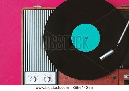 Retro Vinyl Player And Turnable On A Background. Entertainment 70s. Listen To Music. Top View.