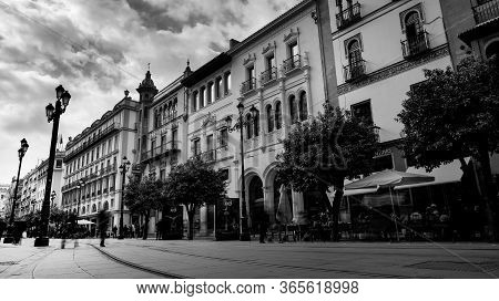 Seville, Spain - 10 February 2020 : Black And White Photography Of Main Boulevard Street In Beautifu