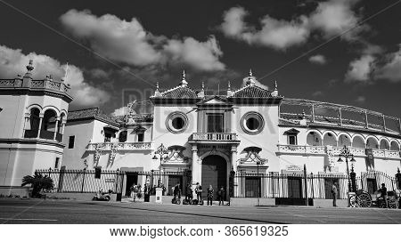 Seville, Spain - 10 February 2020 :black And White Photography Of Plaza De Toros With Tourists Waiti