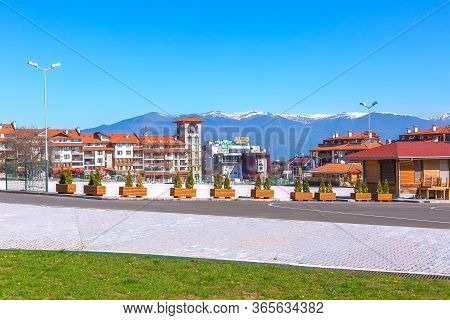 Bansko, Bulgaria - April 14, 2017: Bulgarian Resort Spring View With Aldo, Mountains Peaks Landscape