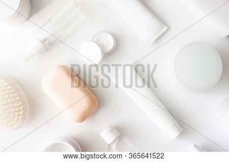 White Squeeze Tube, Bottle Of Cream, Shampoo, Soap, Cleanser, Body Brush, Empty Container Flat Lay O