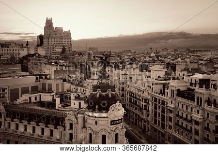 MADRID, SPAIN â MAY 13, 2019: Telefonica Building and historical buildings in business district rooftop view.