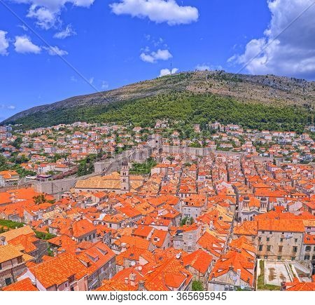 Dubrovnik, Croatia - July 13 2019: Aerial Shot Od The Dubrovnik Old Town Panorama With Hill Srd