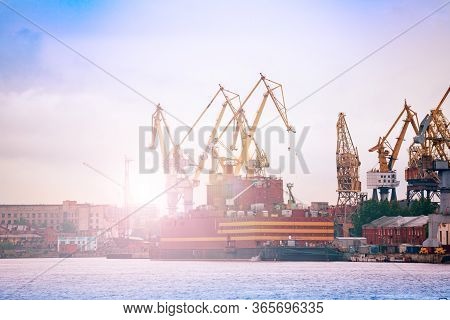 Admiralty Shipyard Or Admiralteyskiye Verfi, With Construction Cranes And Deadweight, Saint Petersbu