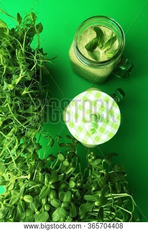 Fresh Organic Healthy Green Smoothie With Spinach, Kiwi, Microgreen Sprouts, Parsley, Celery, Cucumb