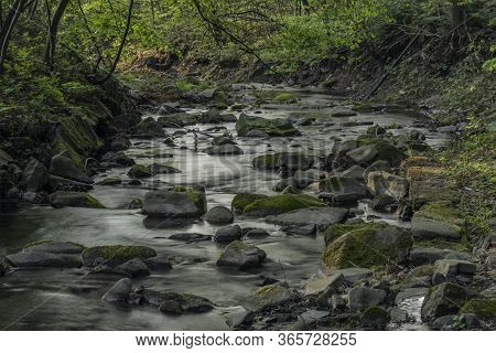 Lomna River In Trojanovice Village In Spring Hot Day