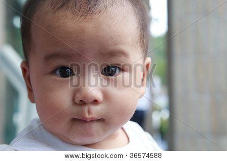 faccia di asiatico bambino 6 mesi