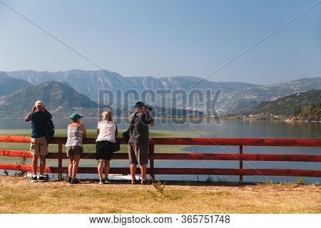 Montenegro, National Park Skadar Lake - September, 21 2018: A Group Of Senior Tourists Looking At A 
