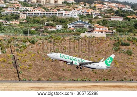 Madeira, Portugal - August 3, 2018: Plane Takes Off From Madeira Airport Runway.