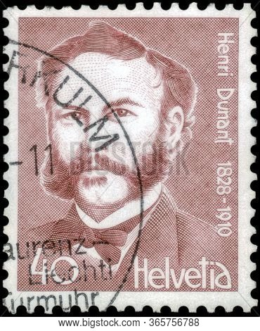 Saint Petersburg, Russia - May 05, 2020: Postage Stamp Printed In The Switzerland With A Portrait Of