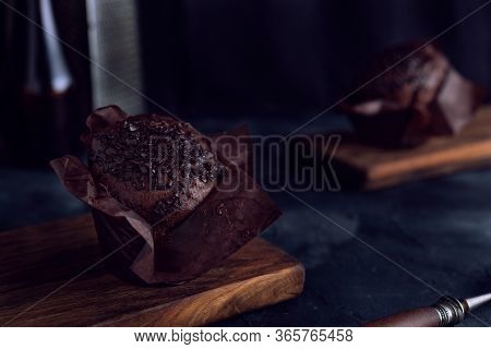 Chocolate Muffin On Dark Background Moody And Calm