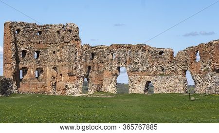 Ludza Medieval Castle Ruins On A Hill Between Big Ludza Lake And Small Ludza Lake. The Ruins Of An A