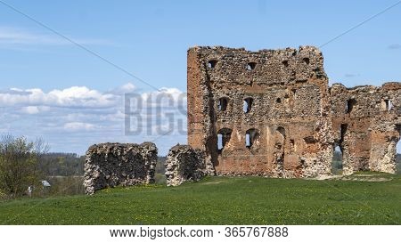 Ludza Medieval Castle Ruins On A Hill Between Big Ludza Lake And Small Ludza Lake. The Ruins Of An A