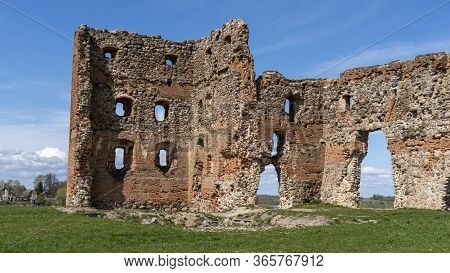 Ludza Medieval Castle Ruins On A Hill Between Big Ludza Lake And Small Ludza Lake. The Ruins Of An A