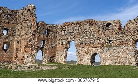 Ludza Medieval Castle Ruins On A Hill Between Big Ludza Lake And Small Ludza Lake. The Ruins Of An A