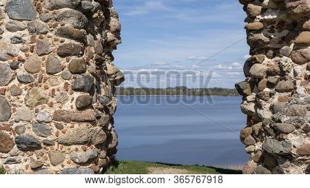 Ludza Medieval Castle Ruins On A Hill Between Big Ludza Lake And Small Ludza Lake. The Ruins Of An A