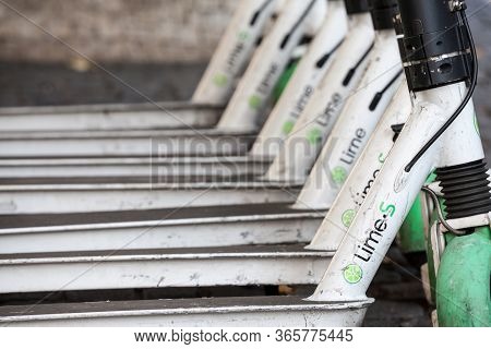 Prague, Czechia - October 31, 2019: Lime Logo On Their Electric Scooters Lined In The Center Of Prag