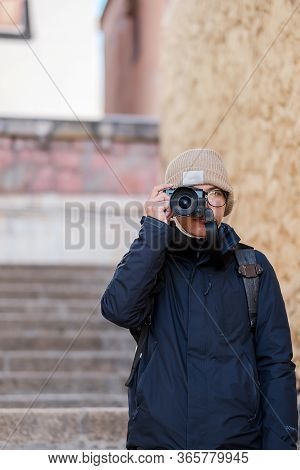 Young Man Traveler With Sweater And Backpack Traveling In Songzanlin Temple, Happy Photographer Taki