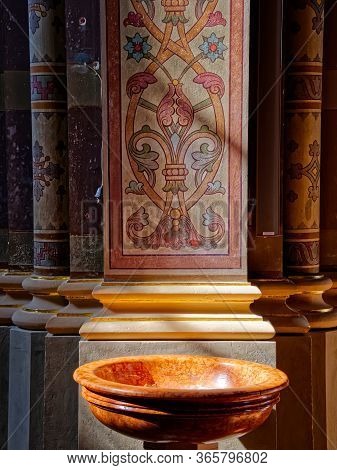 Djakovo, Croatia - October 5, 2017: Old Marble Baptismal Font At The Entrance To The Church Of The C