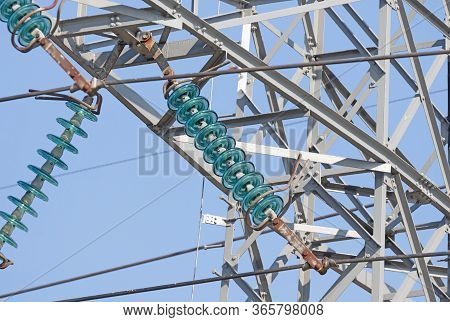 High-voltage Electricity Pylon Against Blue Sky, The Netherlands