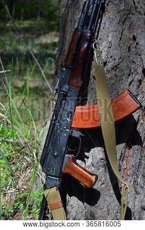 AKMS (Avtomat Kalashnikova) version of Kalashnikov assault rifle in the forest. May 11, 2020 Near Kiev ,Ukraine