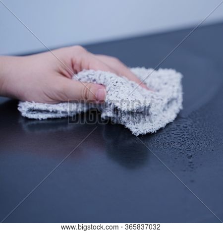 Young Woman Is Holding Spray Bottle, Rag To Clean, Wipe Down Office Metal Cabinet Shelf Accommodatio