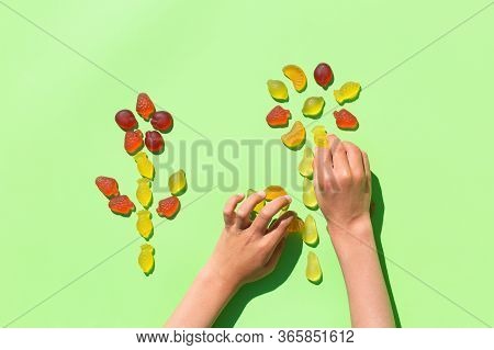 Childs Hands Making Picture With Jelly Candies, Arts And Crafts