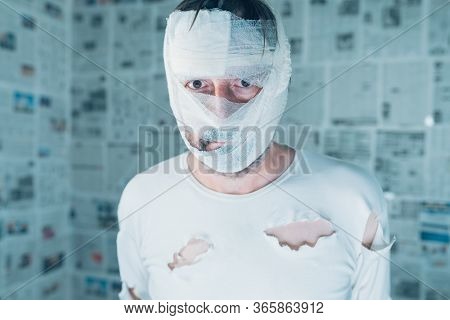 Victim Of Tabloid Journalism And Fake News Infodemic, Conceptual Image Of Man Wrapped In Bandages Su