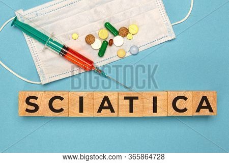 Wooden Cube With Text Sciatica. Medical Concept
