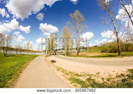 The Road Near The River.
Spring View Of The Province On A Sunny Day.