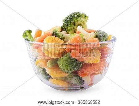 Glass Dish On A White Background, Isolated Pile Of Frozen Vegetables