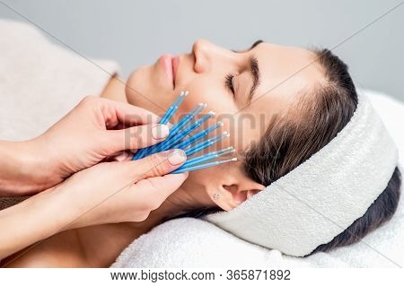 Eyelash Extension Disposable Microbrushes, Eyelash Cotton Swabs In Hands Next To Patient Face Of You