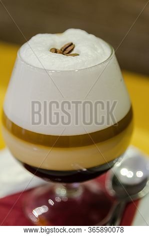 Combination Of Coffee, Cream, Milk And Whisky In A Glass Showing The Different Layers Of Each Ingred
