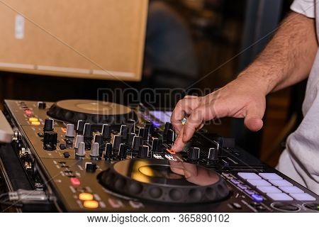 Disc Jockey Playing Music. Running The Mixer Table. Business Party