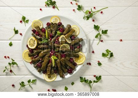 Stuffed Vine Leaves. Cherry And Lemon Leaf Wrapping, Stuffed. Traditional Turkish Stuffed Leaf Wrapp