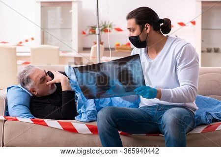 Father and son in coronavirus disease concept at home
