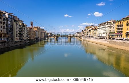 Florence, Italy - August 16, 2019: The Ponte Di Santa Trinita Or Holy Trinity Bridge Over River Arno