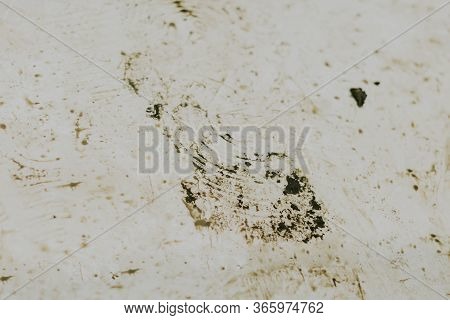 Black Wet Footprints Over Dirty Tiles . Time To Wash The Floor Concept .