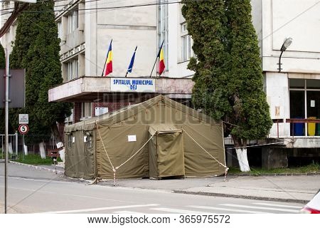 Dej, Romania - 12. May, 2020: Temporary tent set outside emergency room to measure body temperature and check for illness. Coronavirus, covid-19, 2019-nCoV, pandemic, quarantine