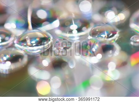 Reflection Of Dropet On Cd In Macro For Background