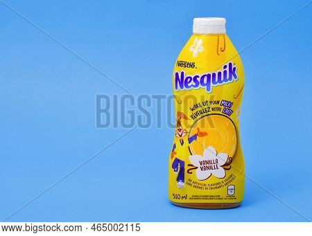 Pleasant Valley, Canada - January 13, 2022: Vanilla Nesquick Bottle On Blue. Nesquik Is A Brand Of F