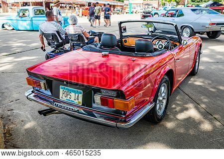 Des Moines, Ia - July 01, 2022: High Perspective Rear Corner View Of A 1970 Triumph Tr6 Convertible 